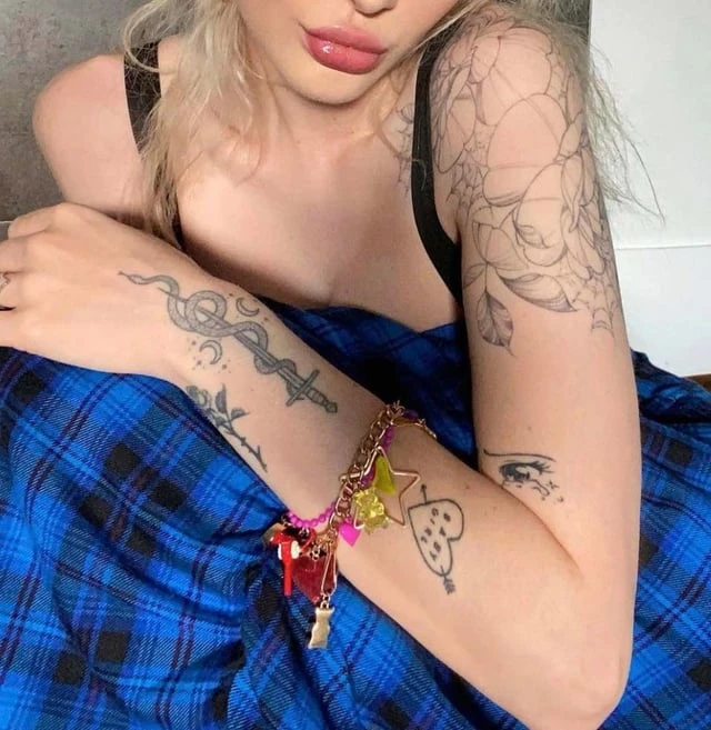 Black tattoo before tattoo removal