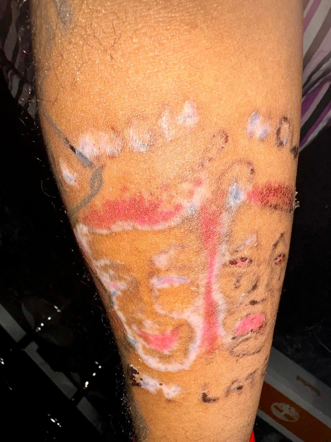 Black And Red tattoo after 1 session