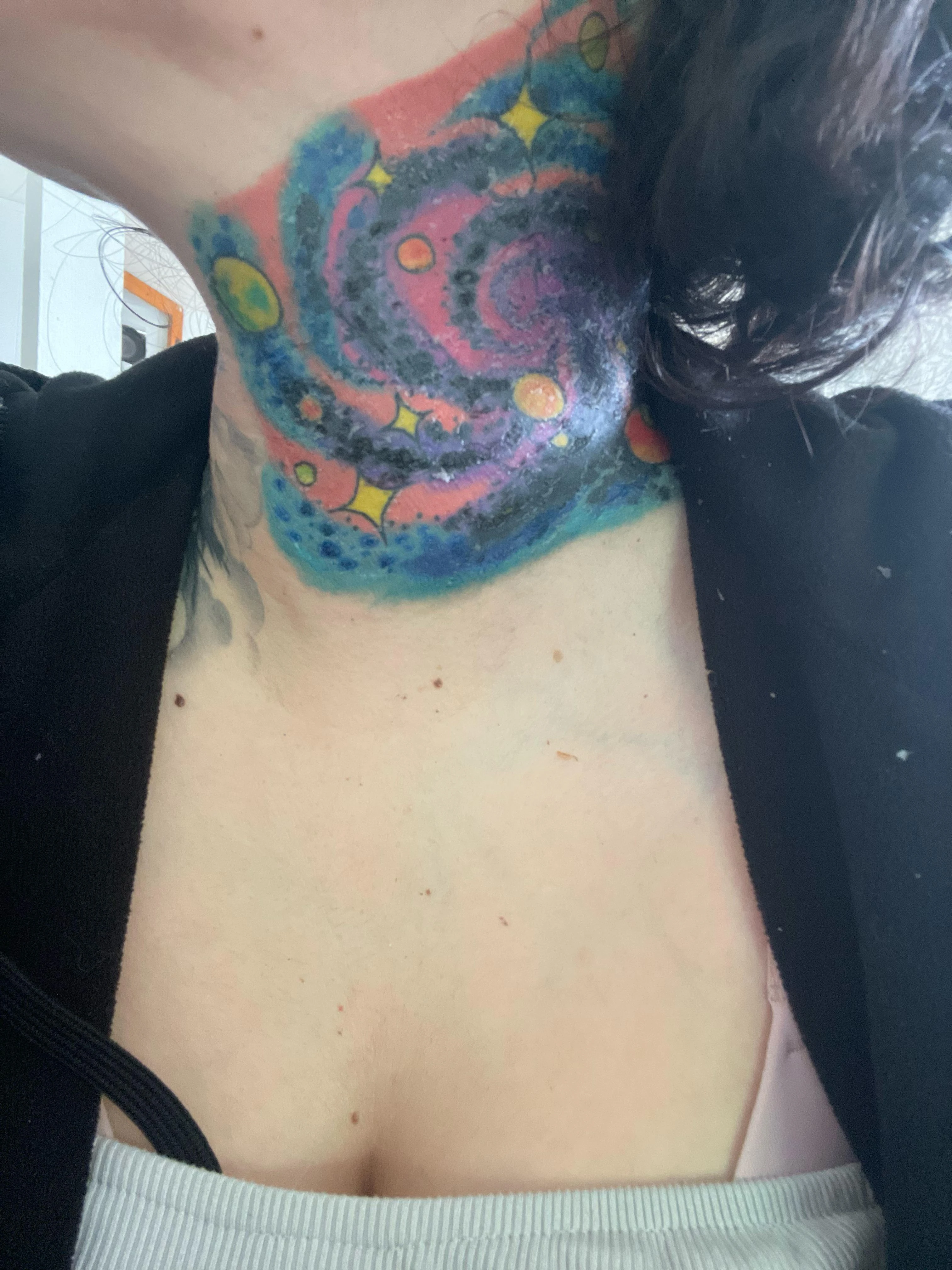 black, red, yellow, blue and purple tattoo before laser removal
