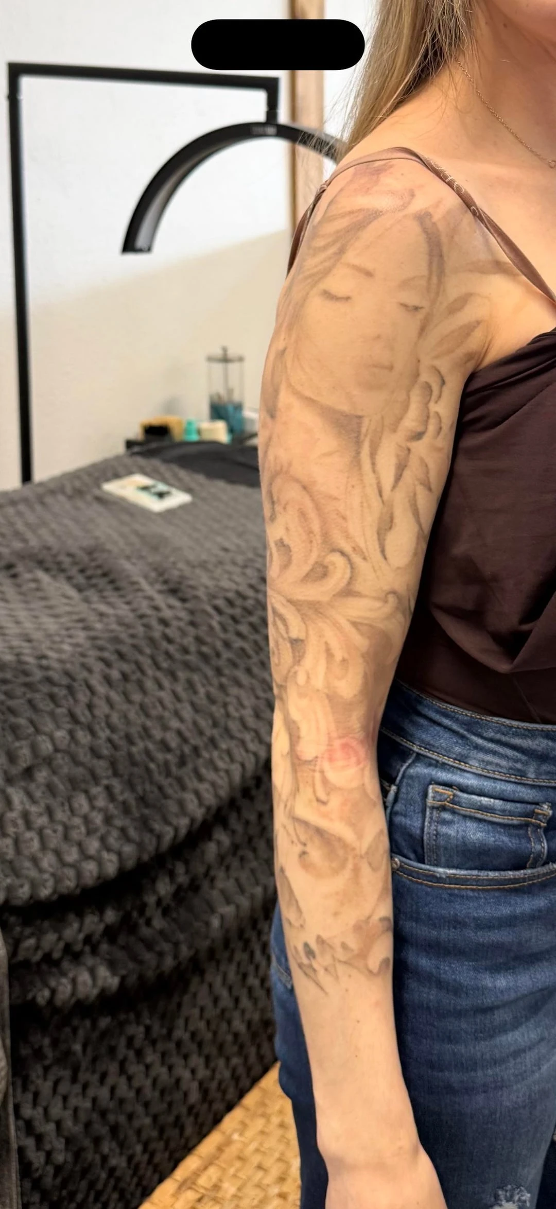 brown and white tattoo before laser removal